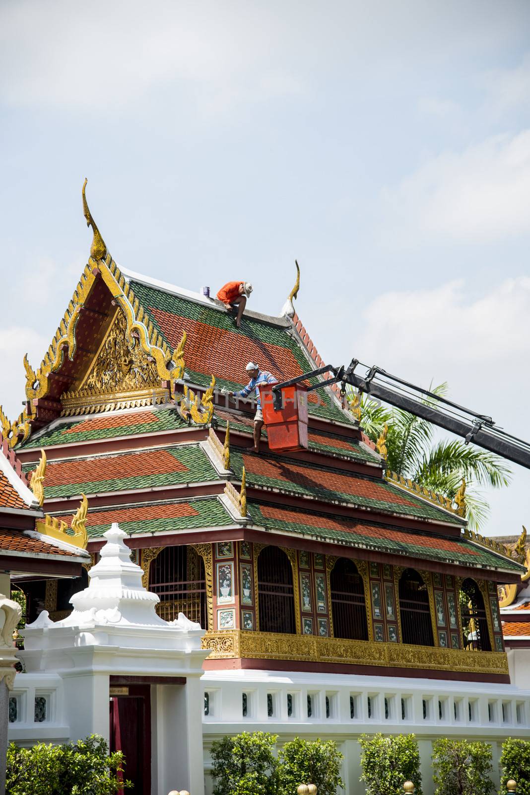 Men repair roof of Temple1