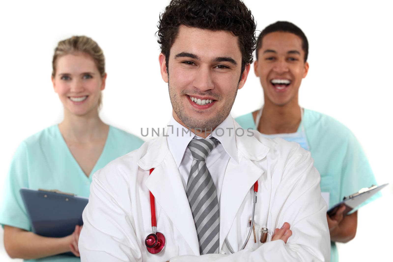 Doctor and nurses laughing by phovoir