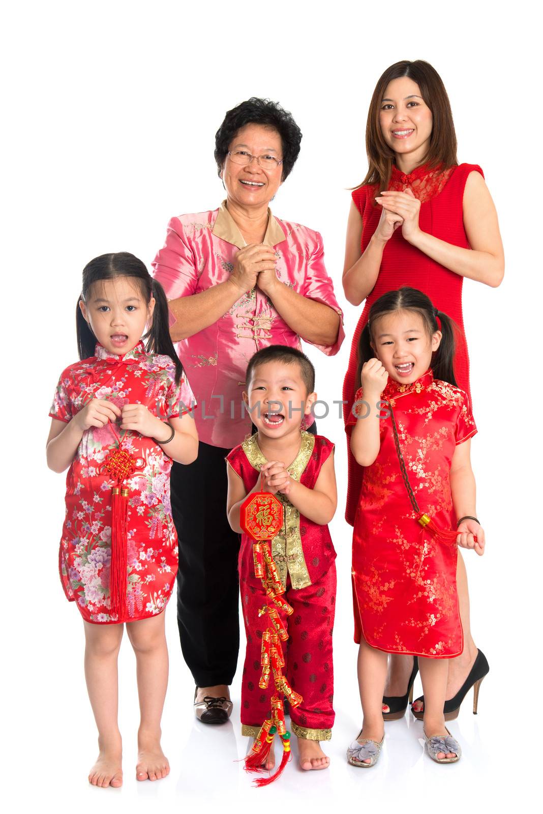 Asian Chinese family greeting on Chinese New Year by szefei