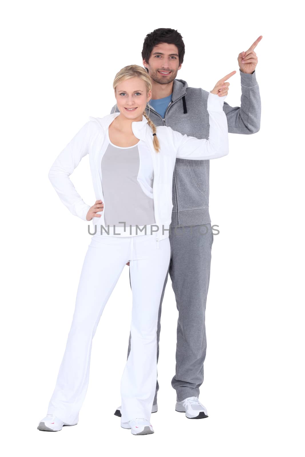 Couple dressed in tracksuits