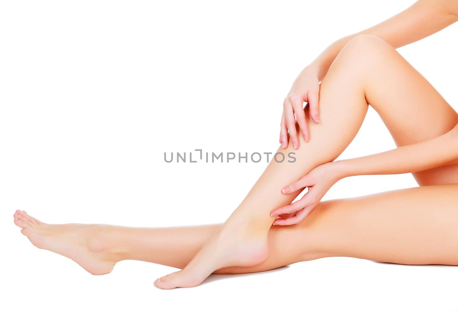 Female legs and hands, white background by Nobilior