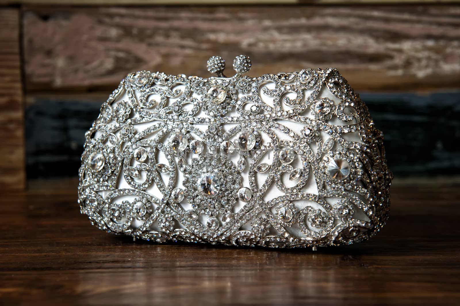 Image of a jeweled clutch /purse