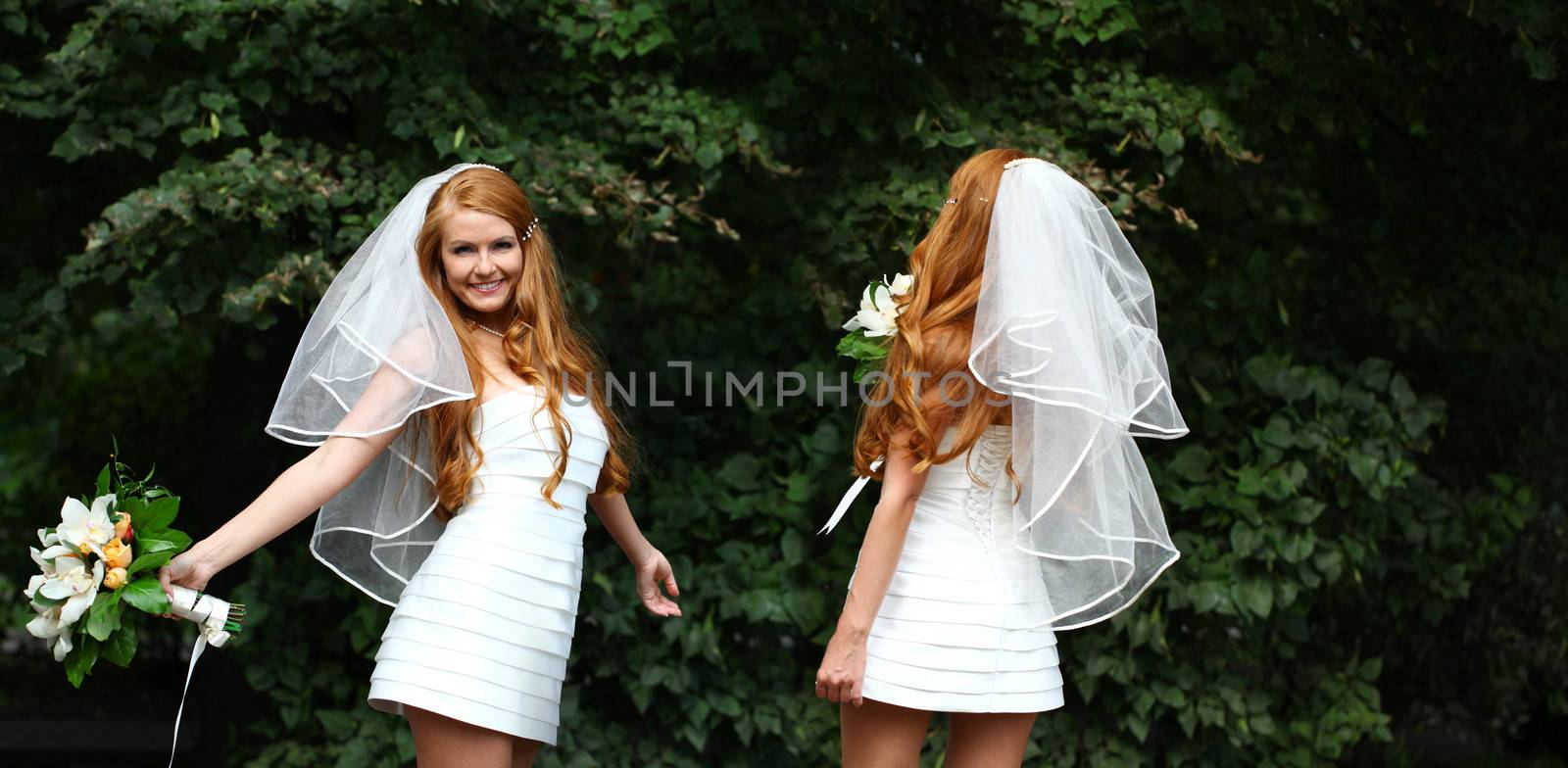 Portrait of beautiful bride with flowers