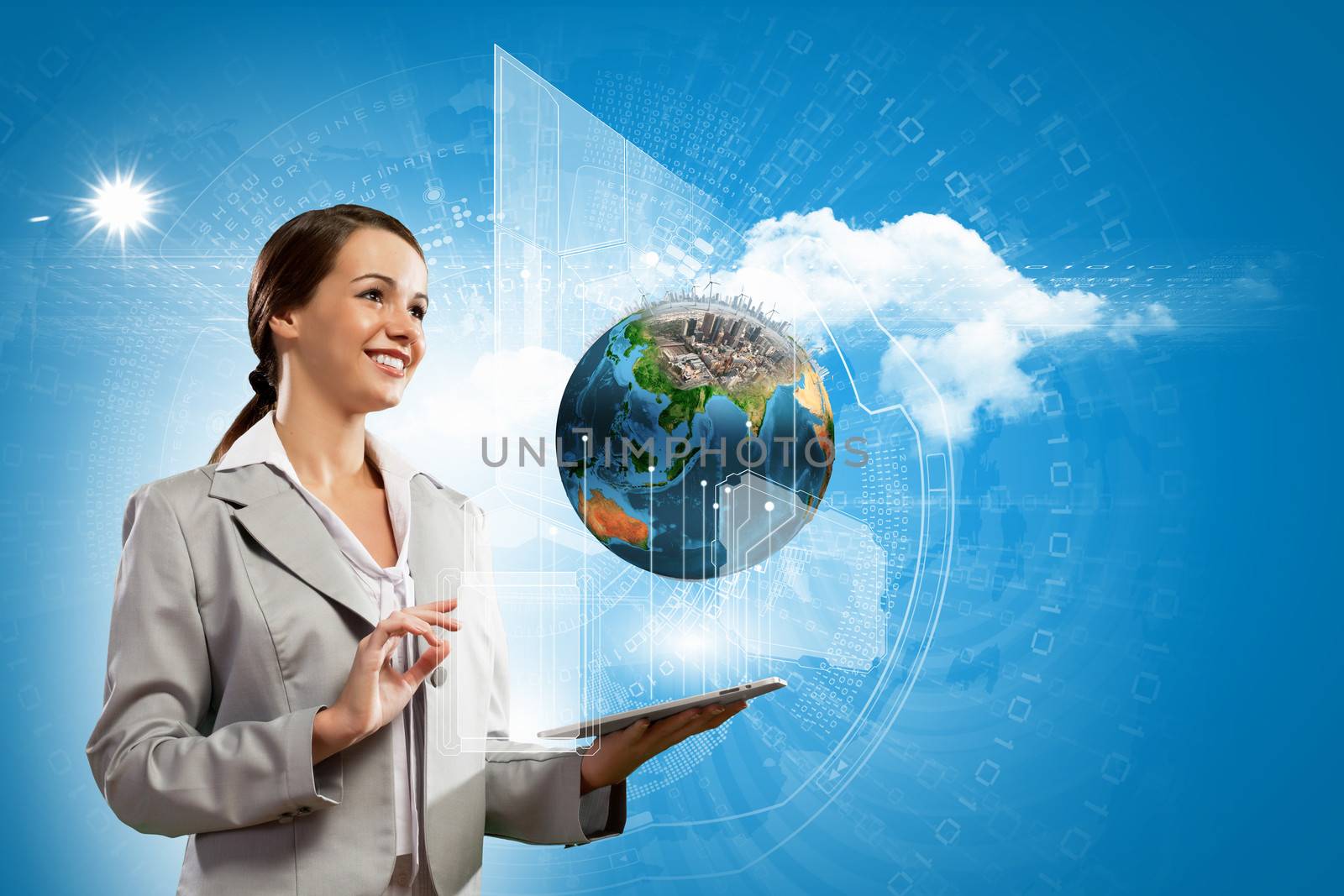 Young businesswoman with tablet pc in hands. Globalization concept. Elements of this image are furnished by NASA