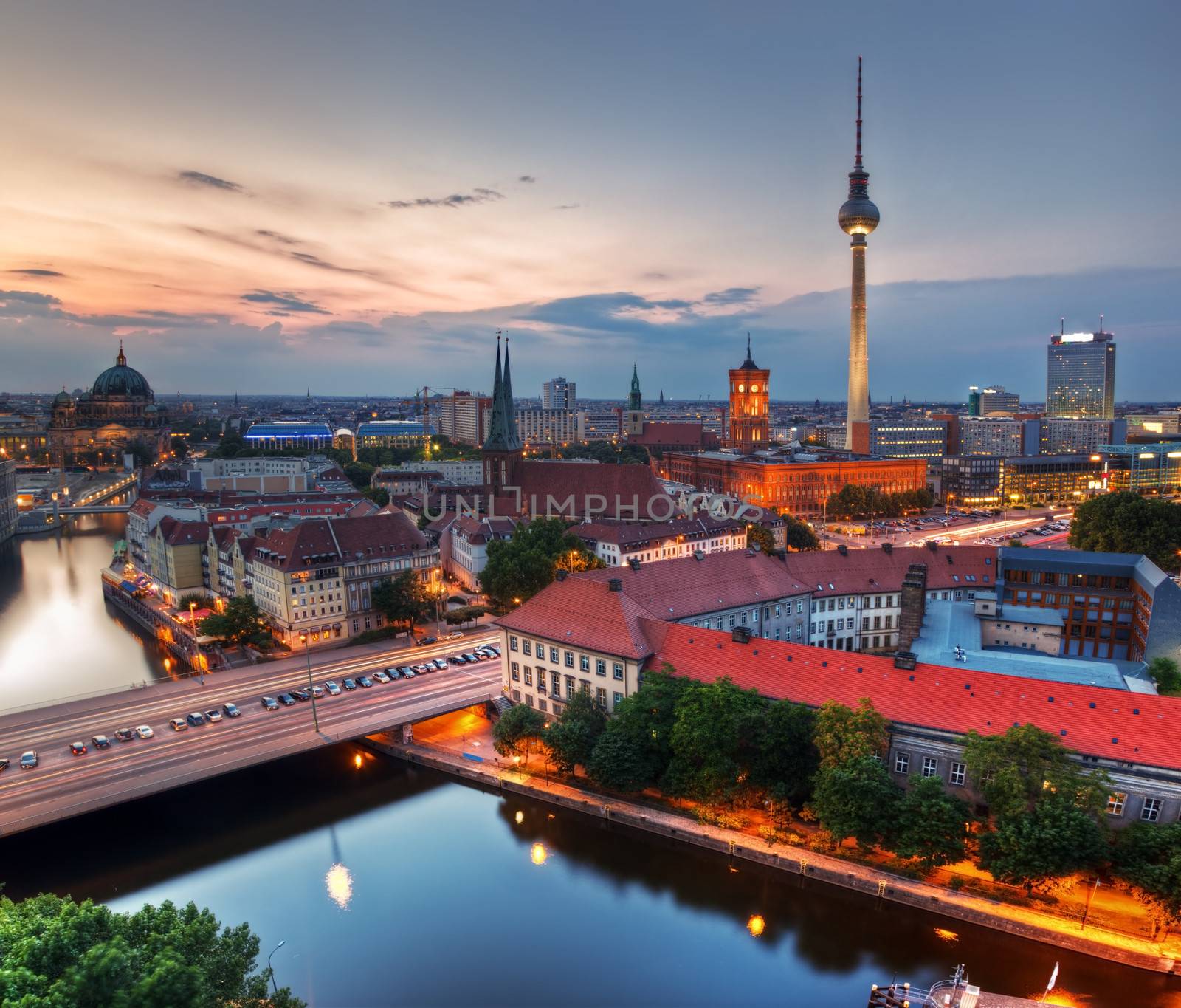Berlin, Germany rooftop view on Television Tower, Berlin Cathedral, Rotes Rathau and the River Spree - the major landmarks at late sunset