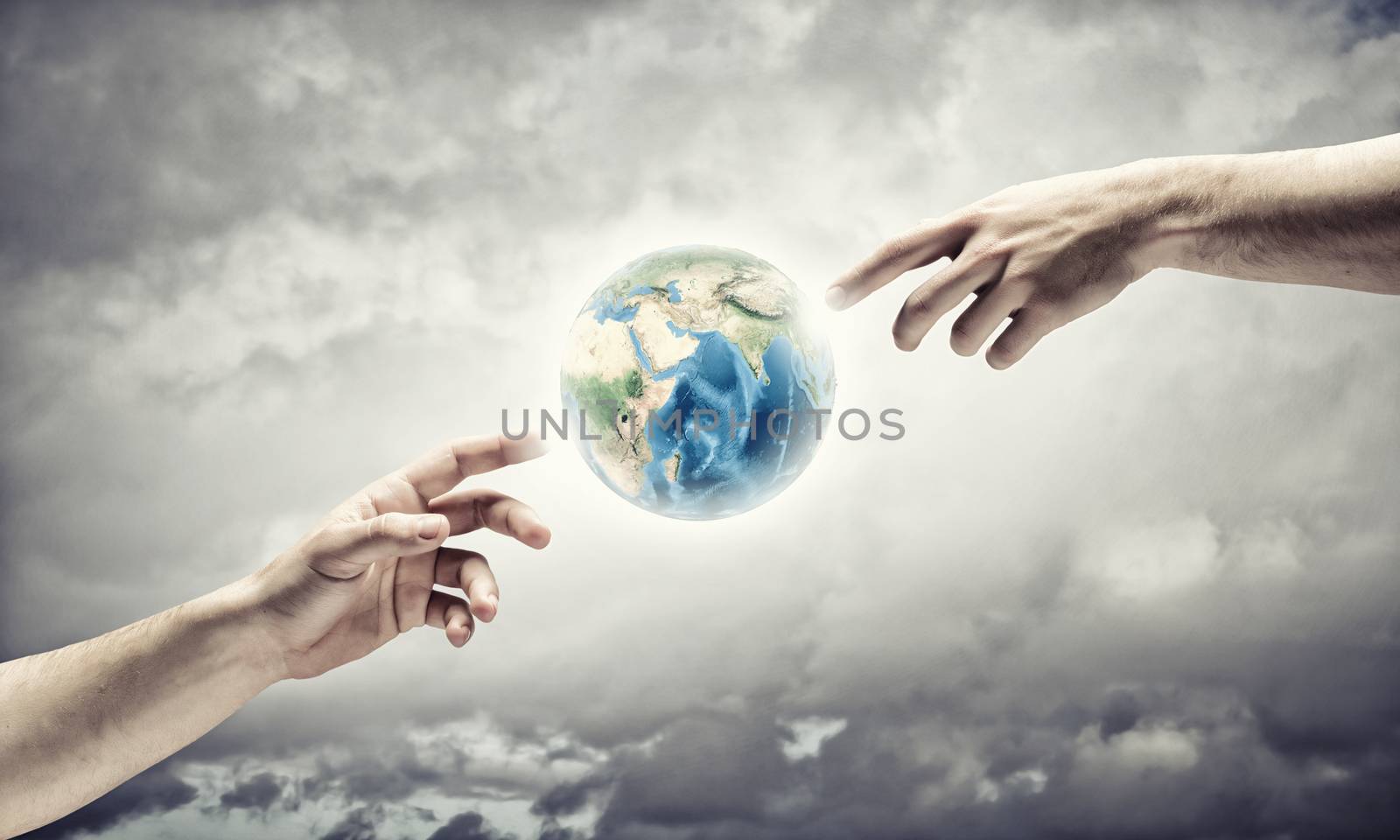 Close up of human hands touching with fingers. Elements of this image are furnished by NASA