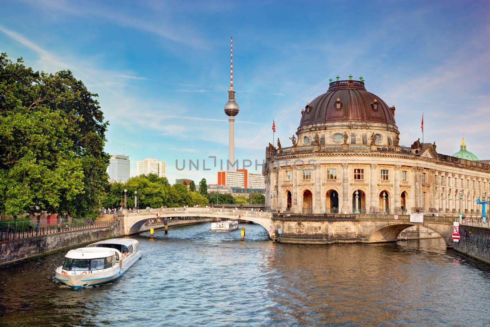 The Bode Museum on the Museum Island in Berlin, Germany. Tourist ship on River Spree