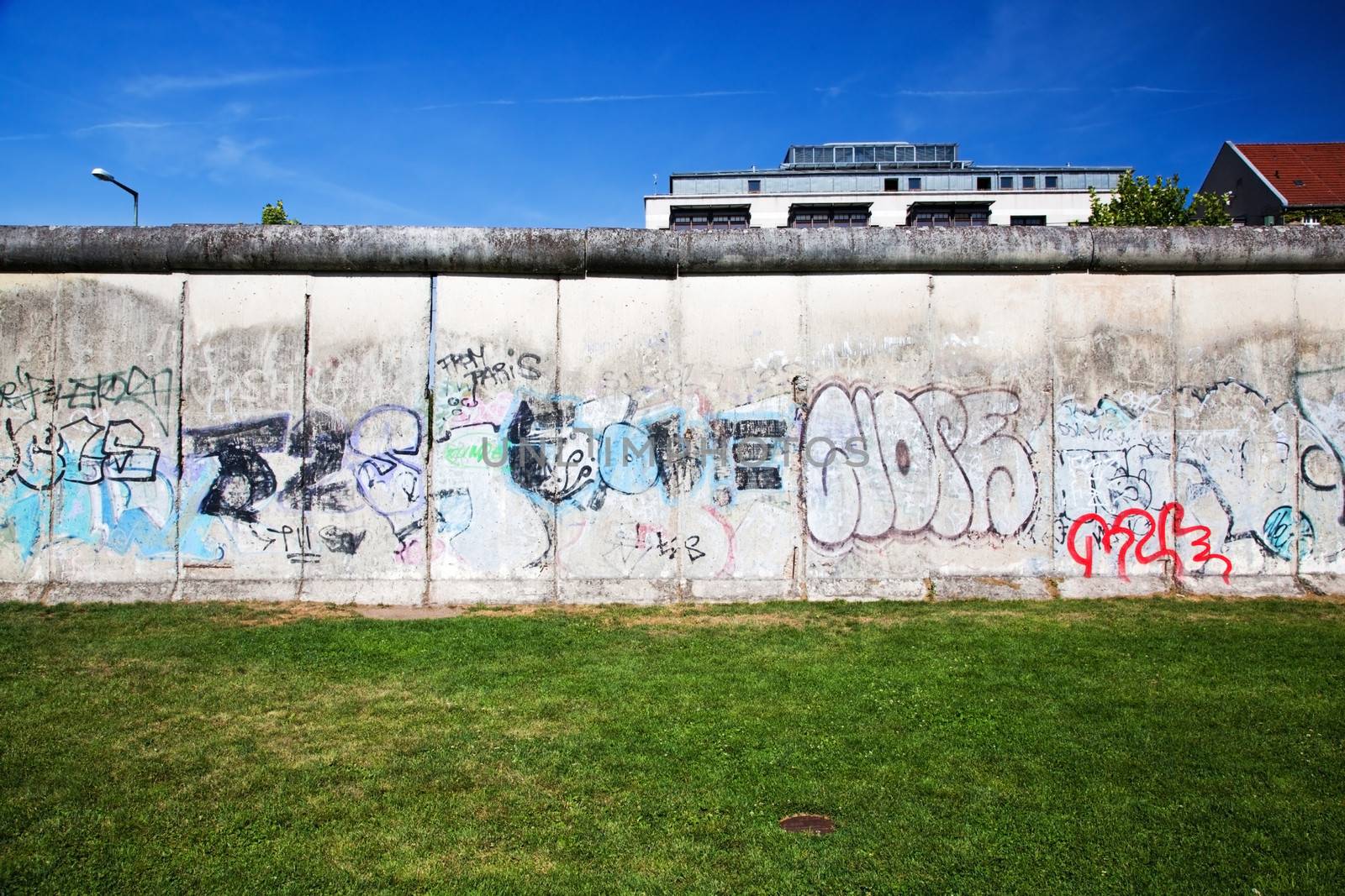 Berlin Wall Memorial with graffiti.  by photocreo