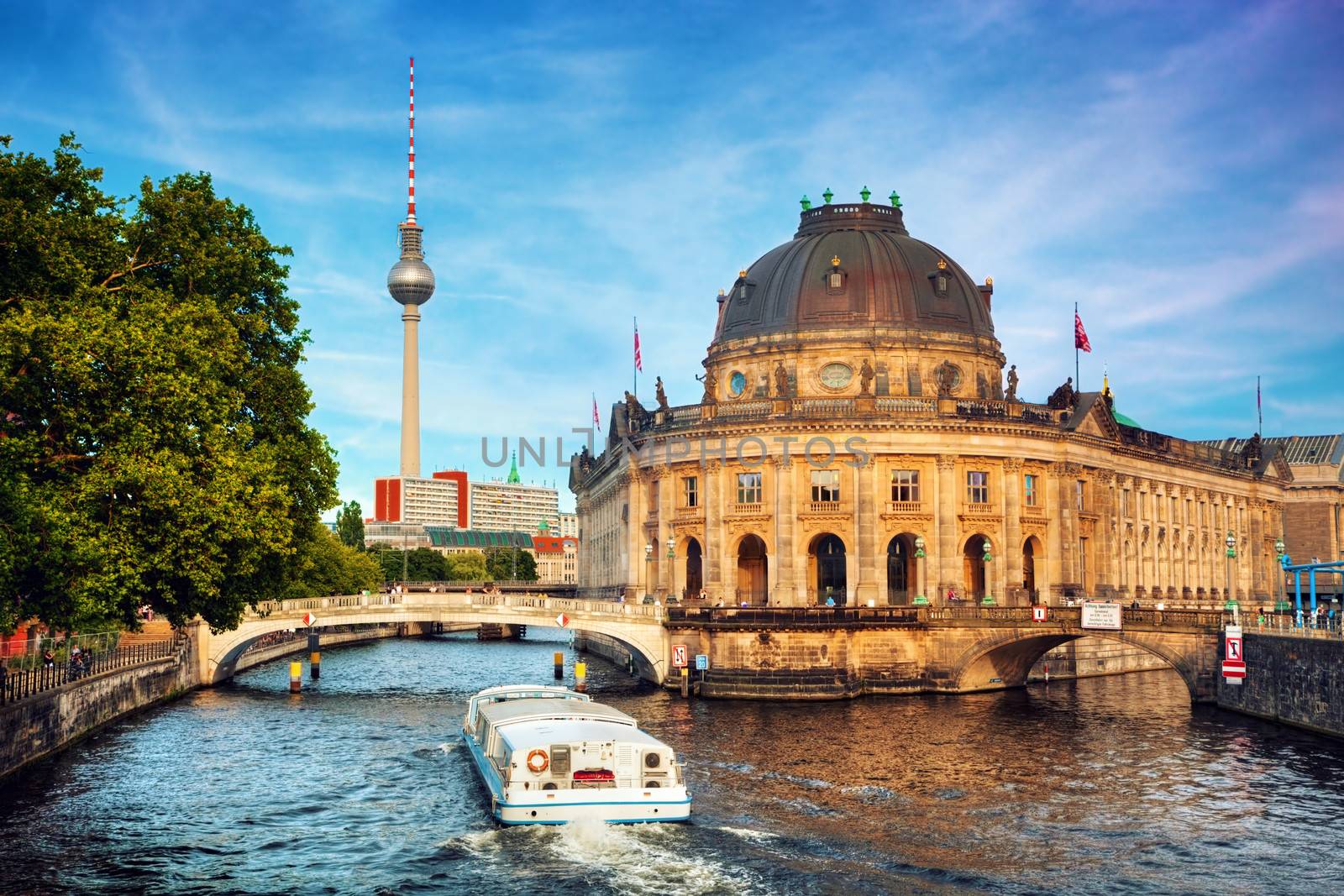 The Bode Museum on the Museum Island in Berlin, Germany. Tourist ship on River Spree