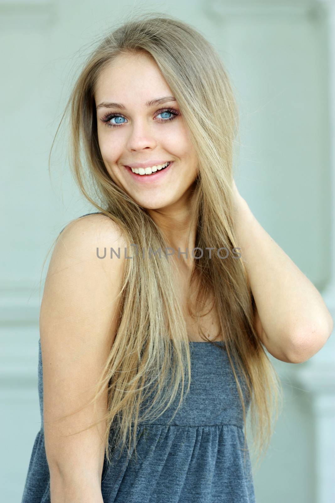 Beautiful young girl smiling. Outdoor portrait