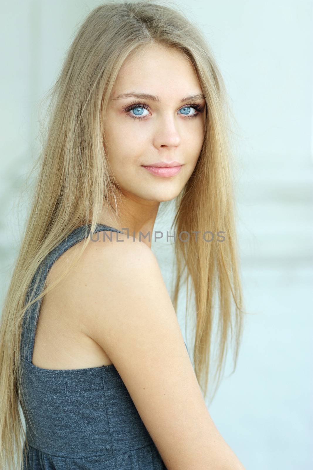 Beautiful young blonde woman by andersonrise