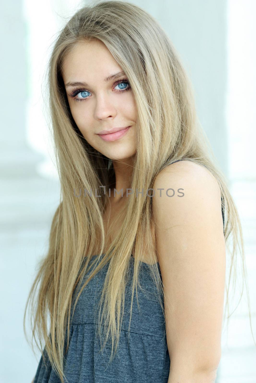 Beautiful young blonde woman. Outdoor portrait