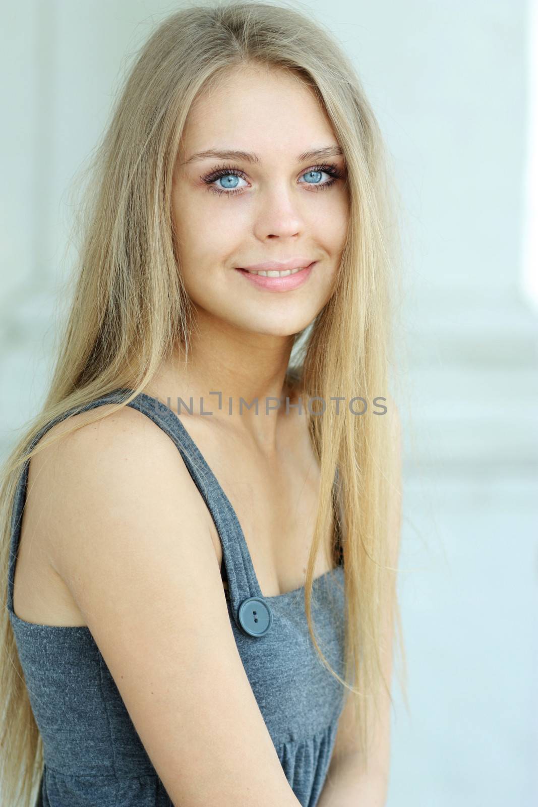Beautiful young blonde woman. Outdoor portrait