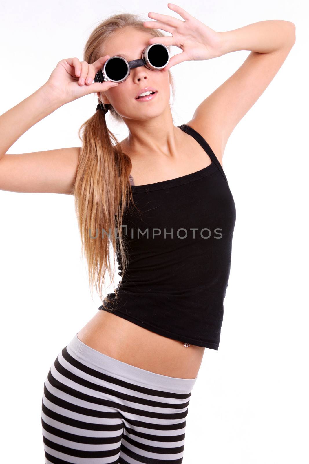 Happy young woman in sunglasses by andersonrise