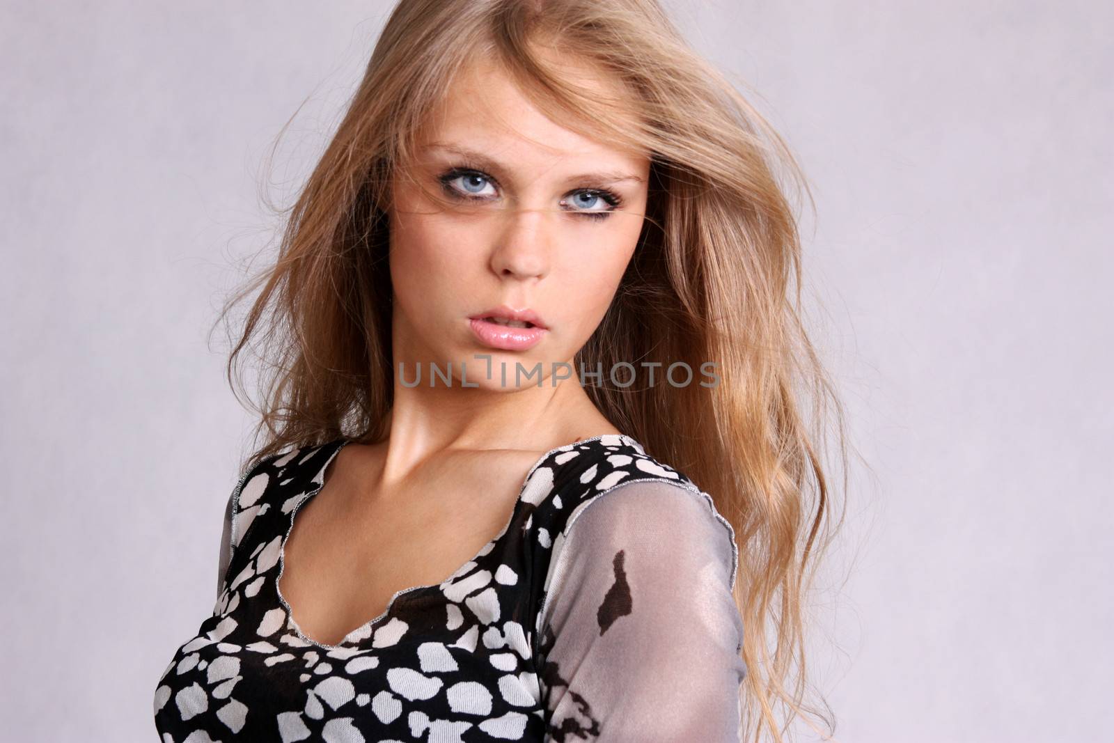 Portrait of young beautiful blond woman