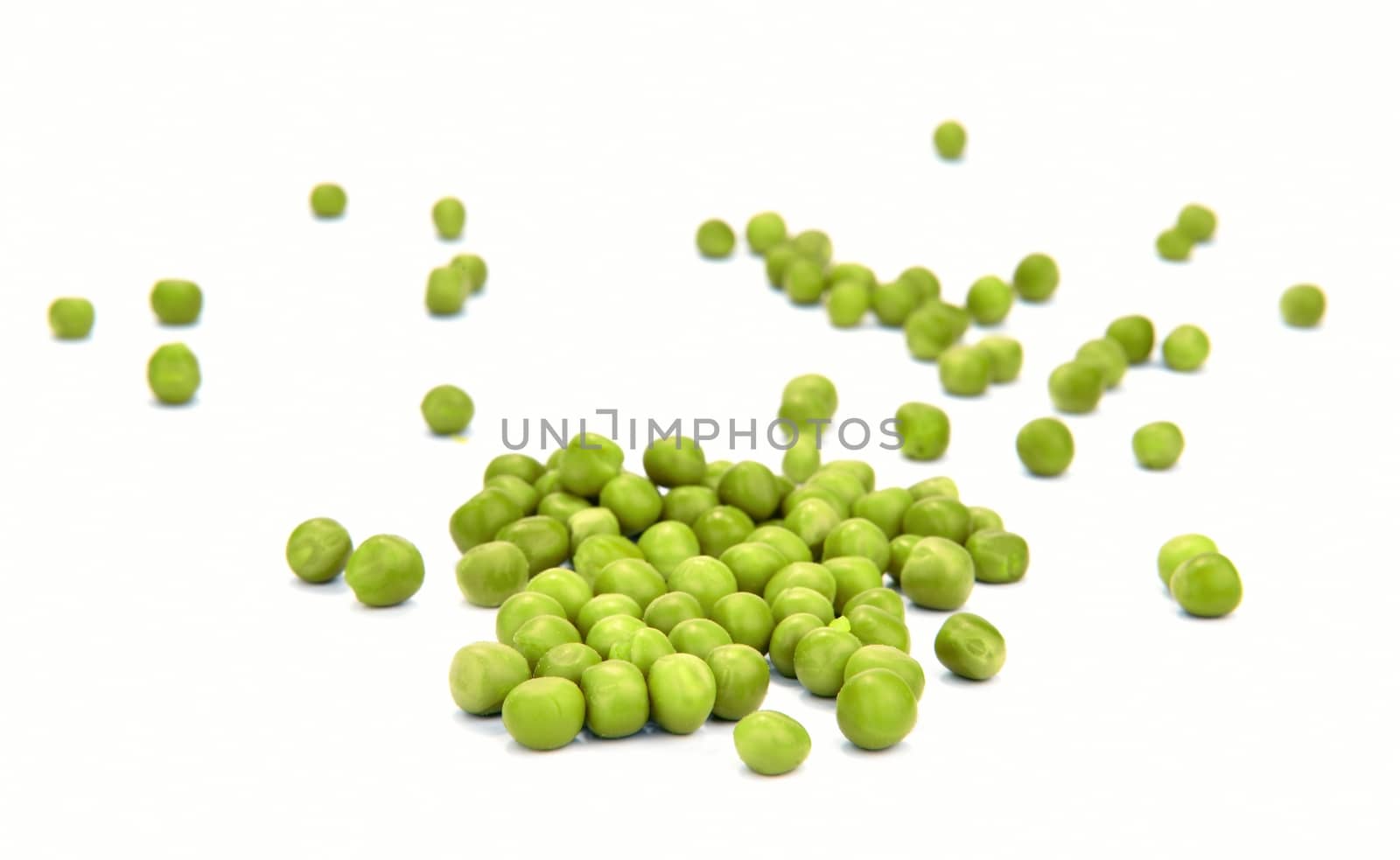 isolated cooked peas over white background