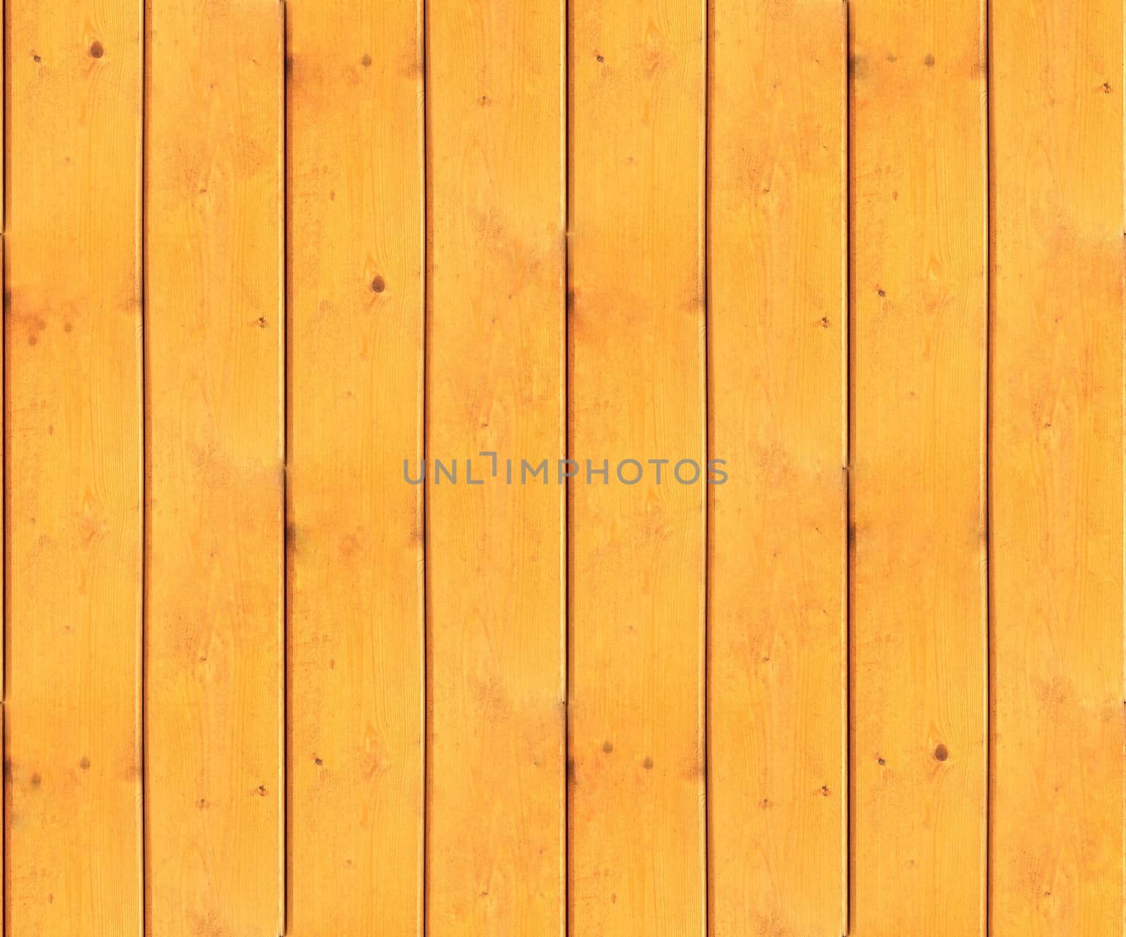 Picket fence made of pine wood as a seamless tileable texture