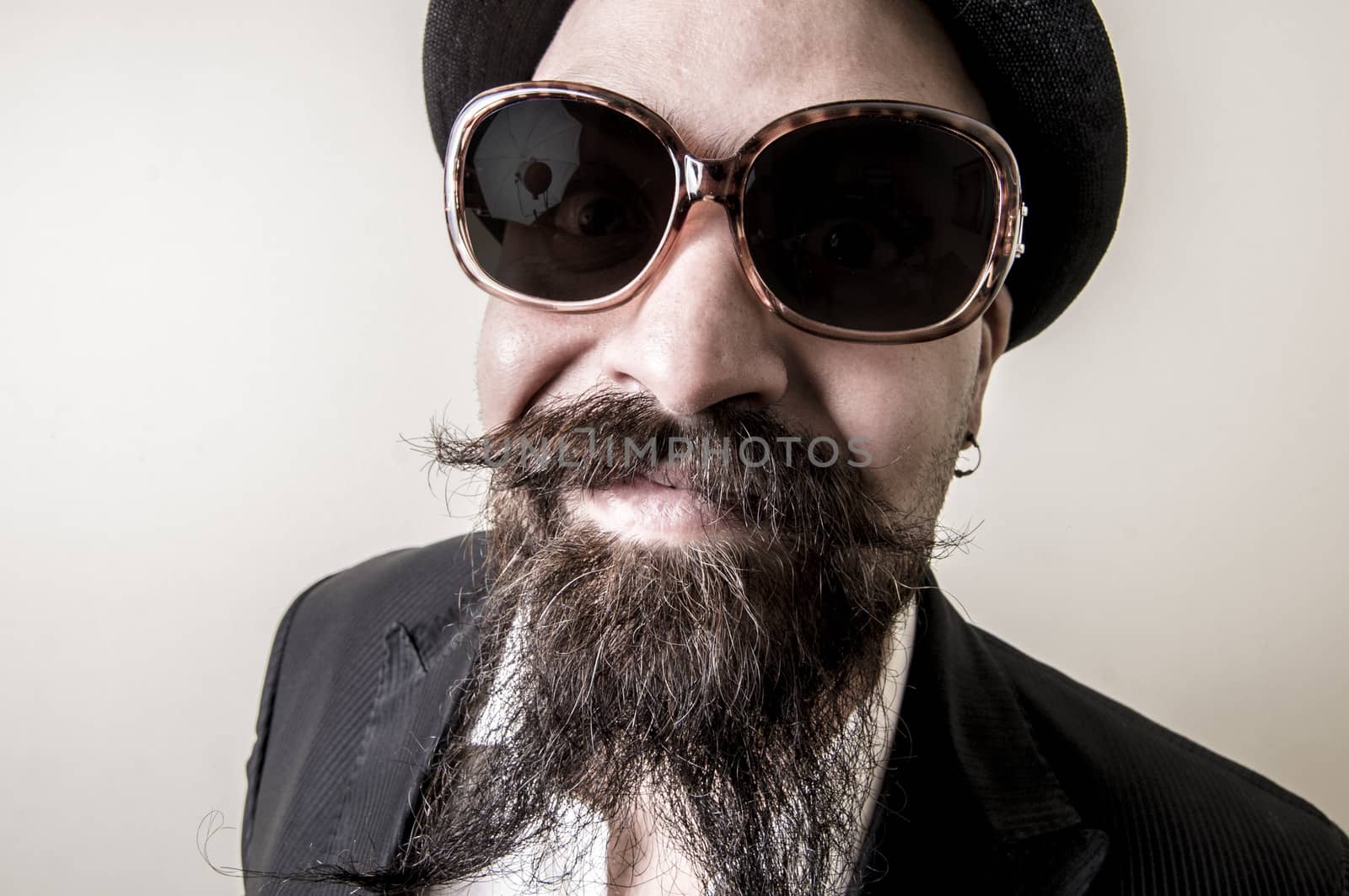 long beard and mustache hipster with elegant suit