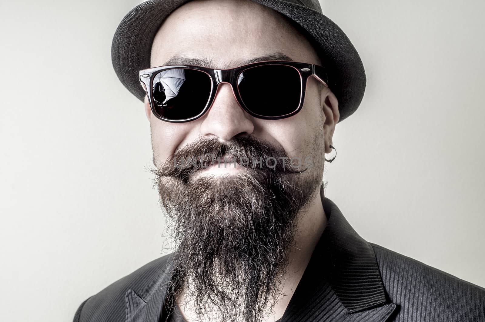 long beard and mustache hipster with elegant suit