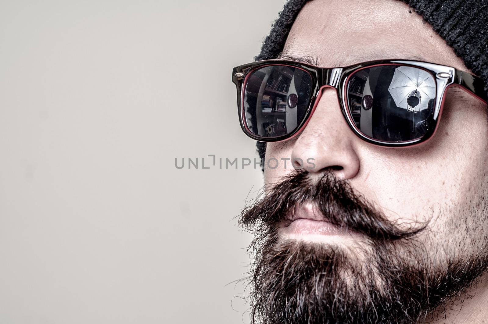 long beard and mustache hipster with elegant suit 
