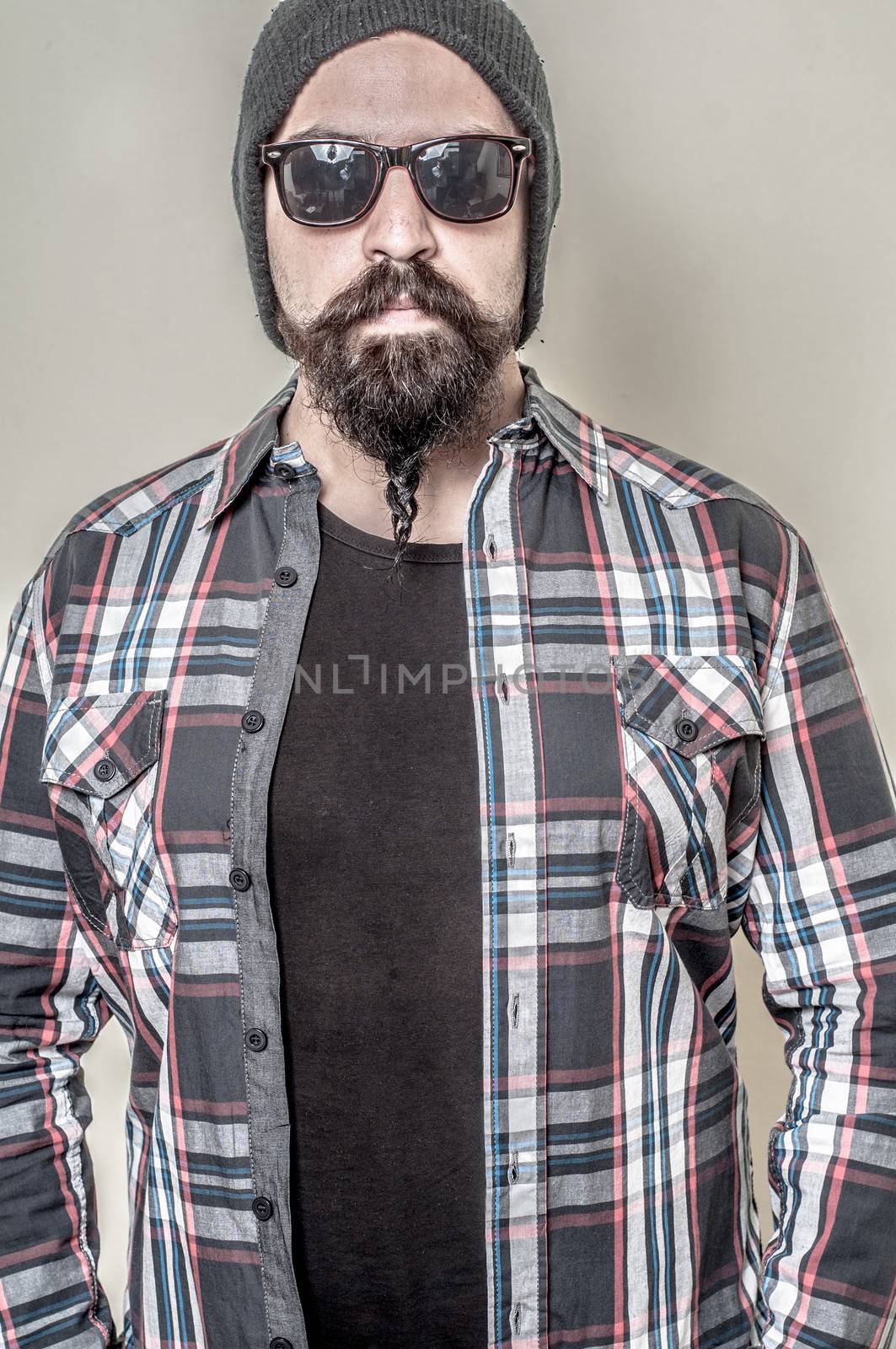 long beard and mustache hipster with elegant suit 