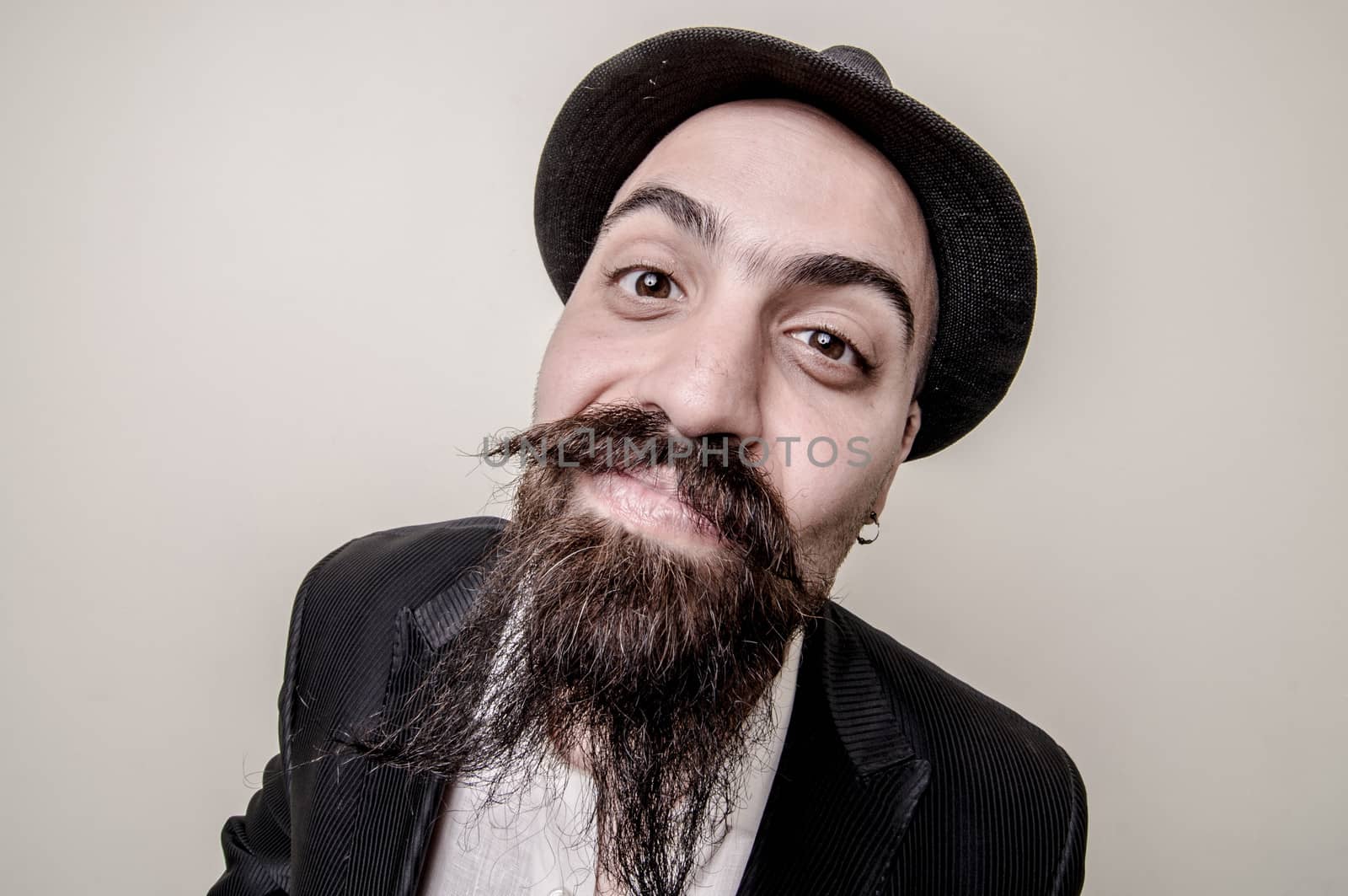long beard and mustache hipster with elegant suit 