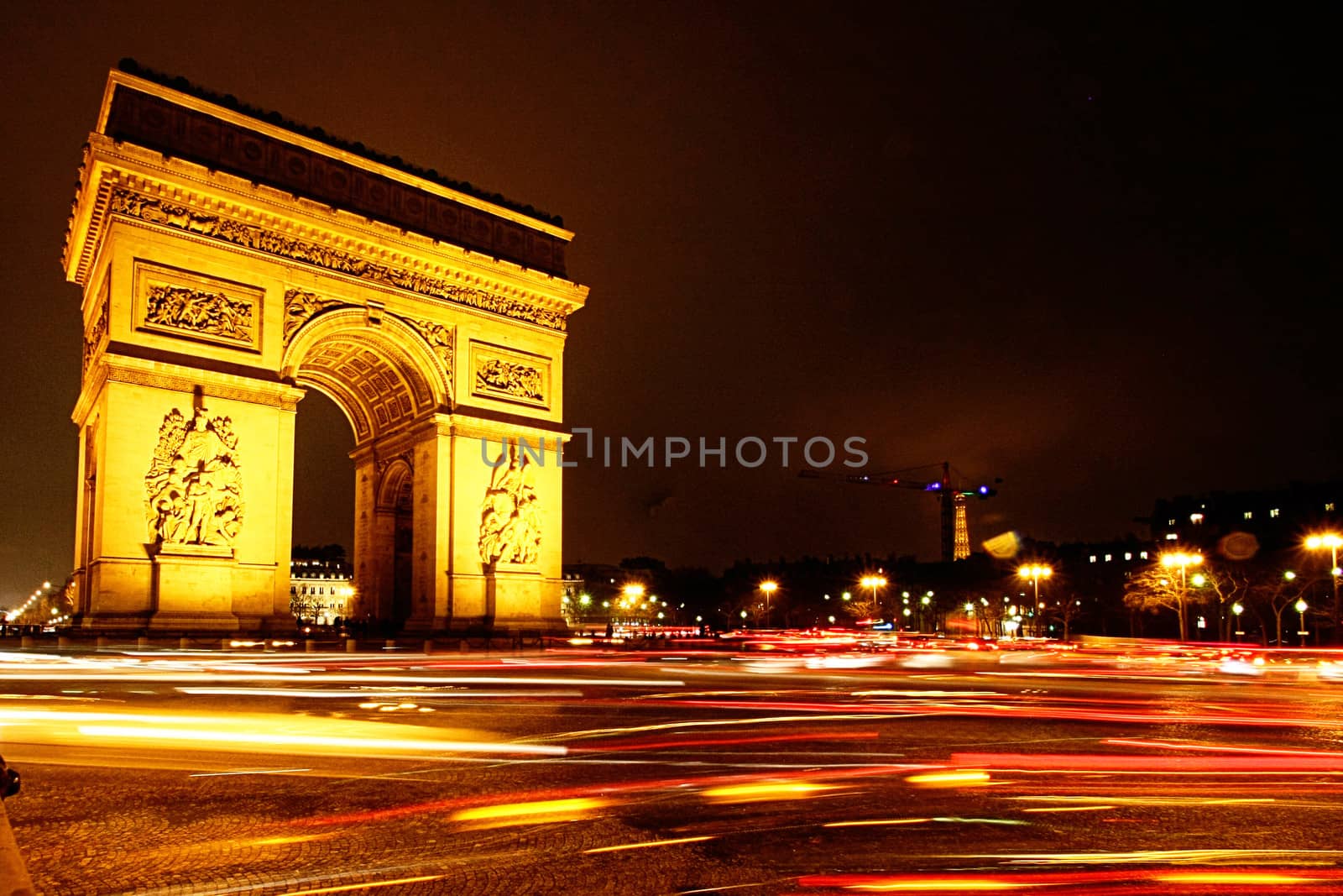 Beautiful travel photo with Arch of Triumph at Night in France