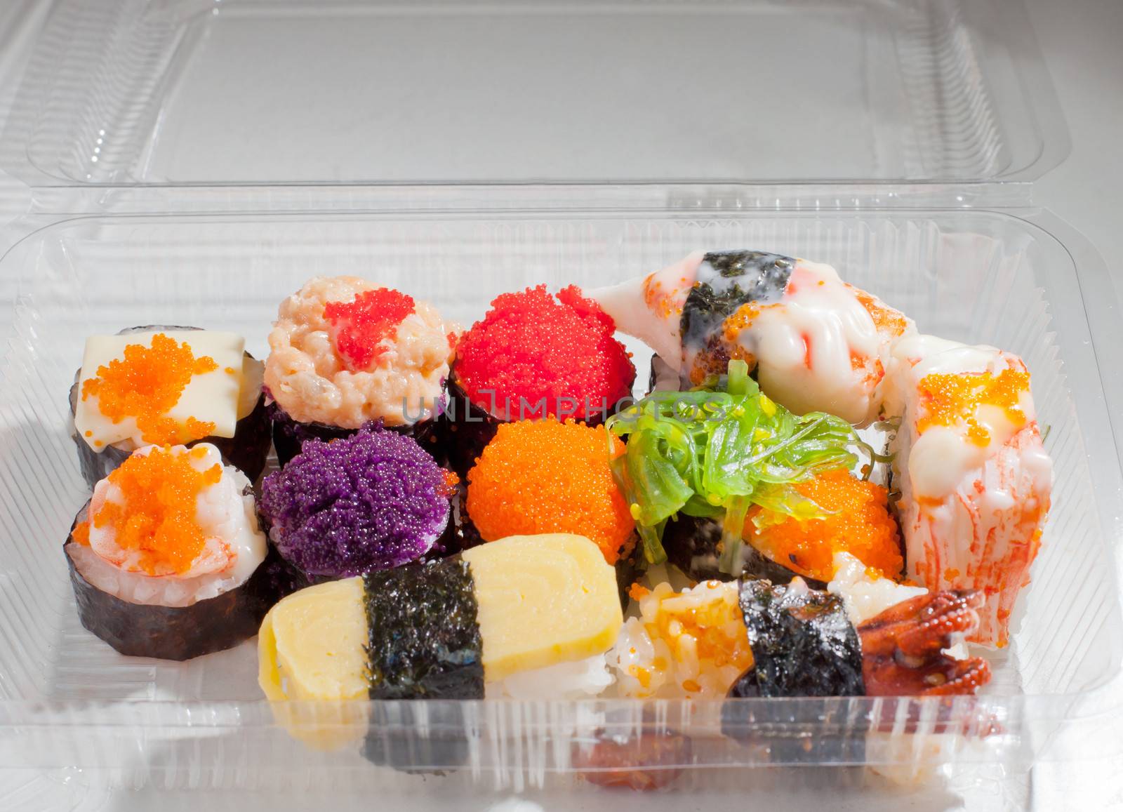 japanese food "sushi" in plastic box by khunaspix