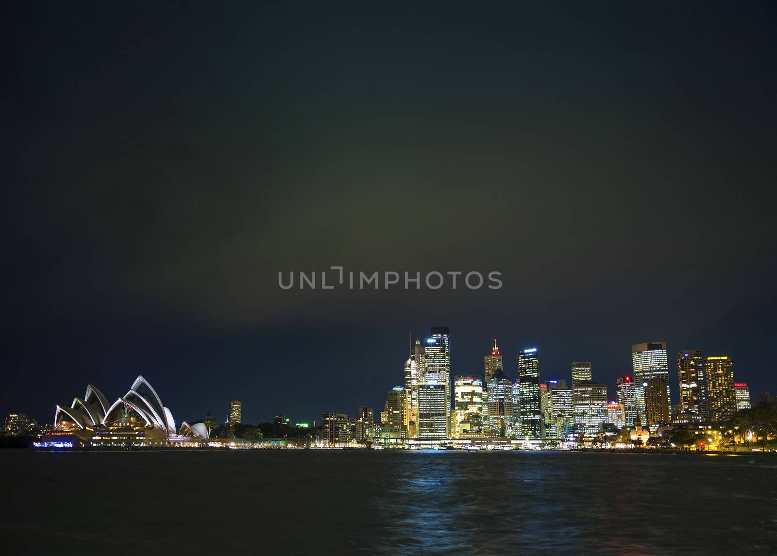 sydney harbour skyline in australia at night