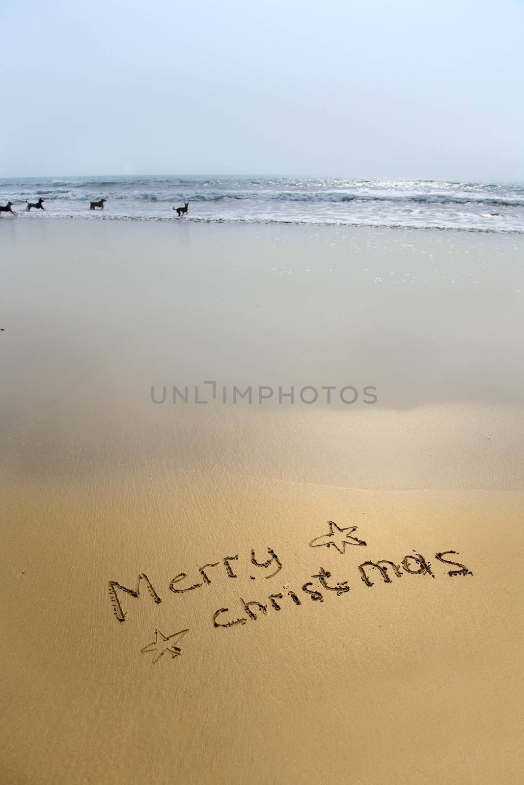 merry christmas written in sand by foryouinf