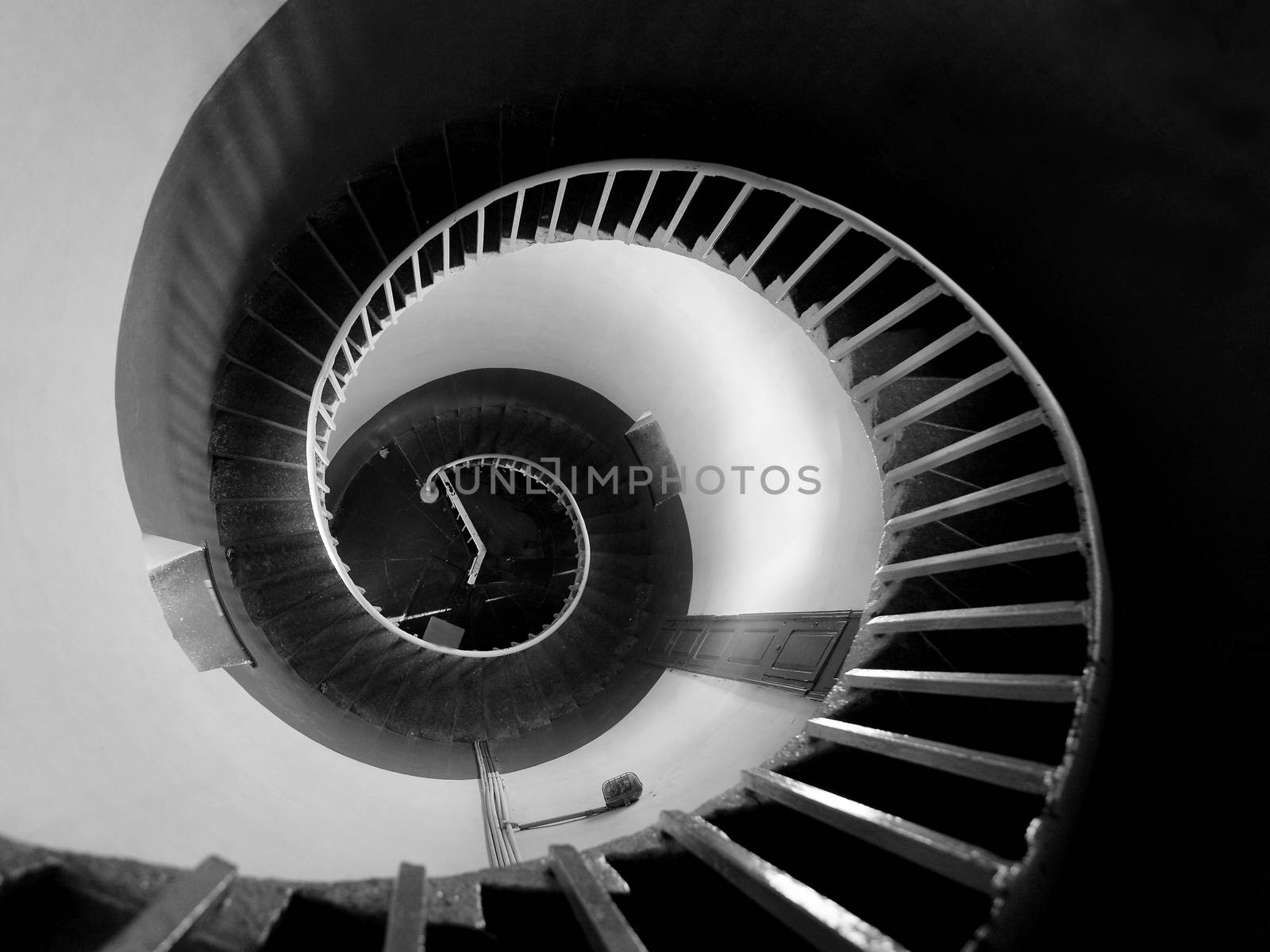 Upside view into the spiral of a lighthouse in Mamalipuram, India