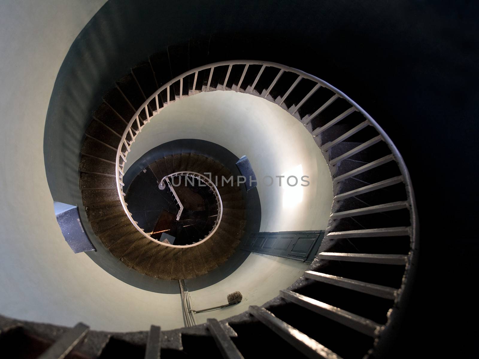 Upside view into the spiral of a lighthouse in Mamalipuram, India