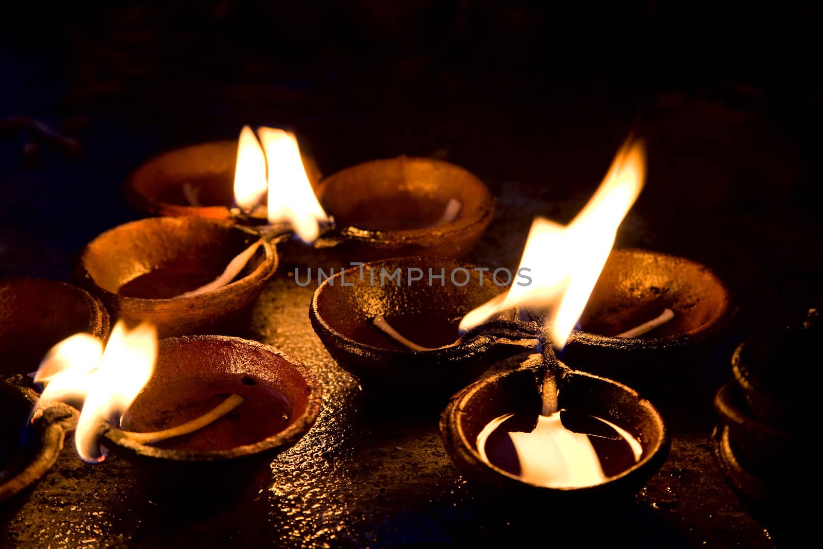 Burning candles at altar  in buddhist temple, Sri Lanka 