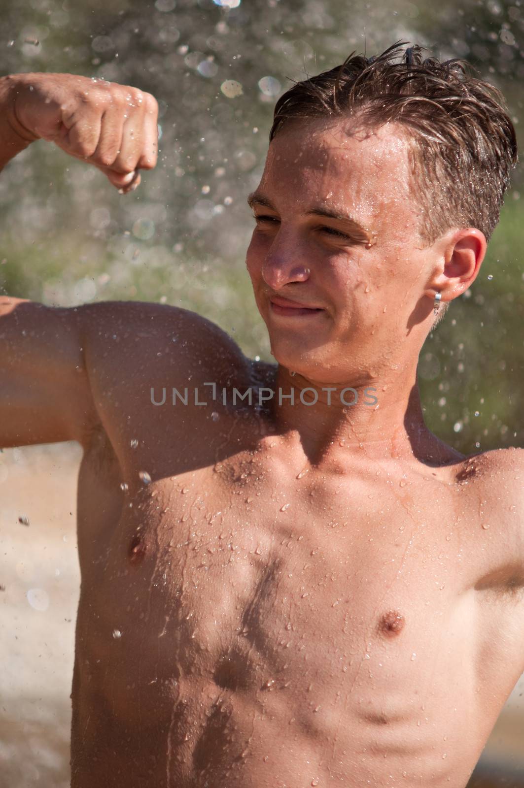 Young man with atletic body . by LarisaP