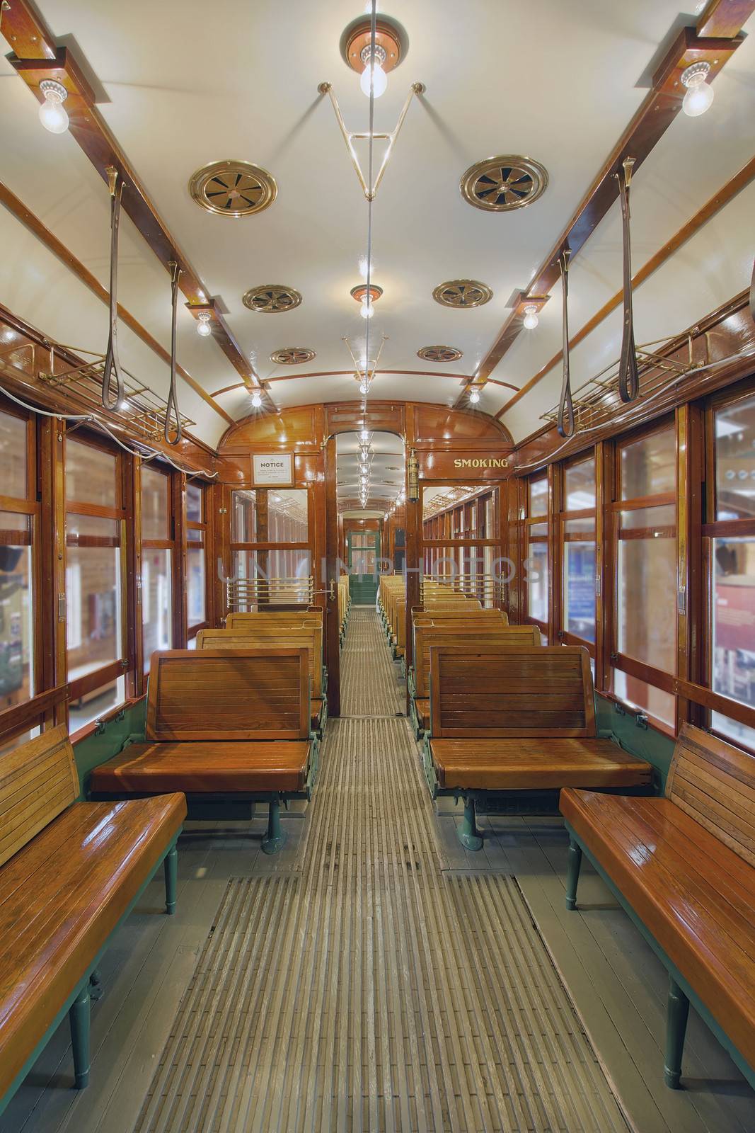 Old Historic Restored Tram Interior with Wood Bench Seats in Gentleman Smoking Section