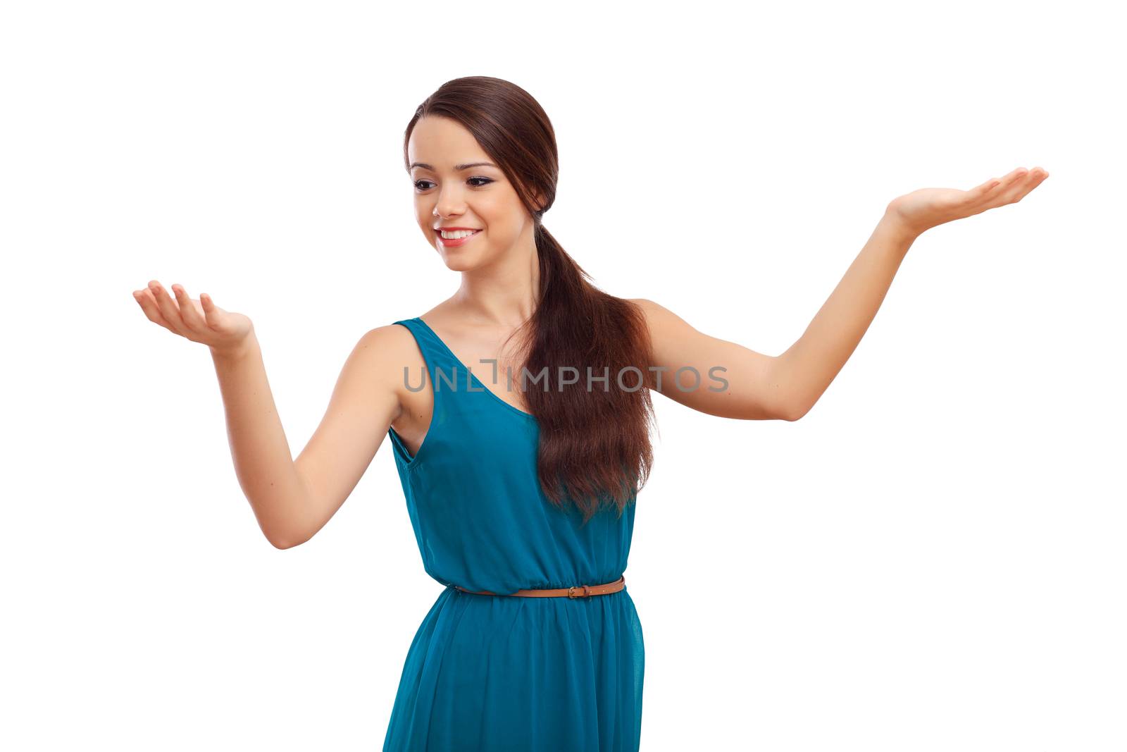 Beautiful young brunette woman in blue dress