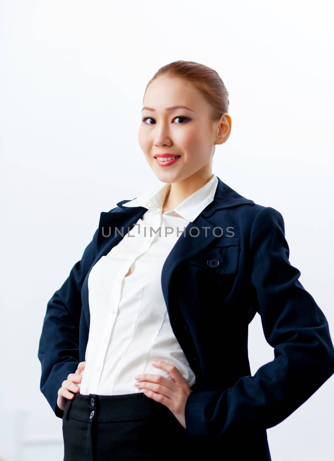 Attractive businesswoman in formal suit by sergey_nivens