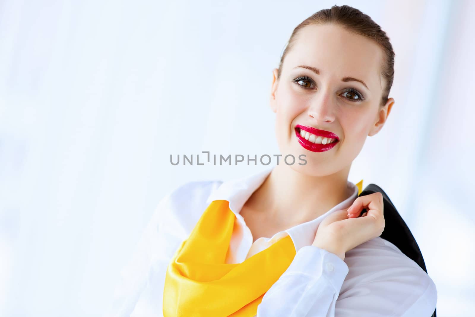 Image of attractive successful businesswoman in business suit smiling