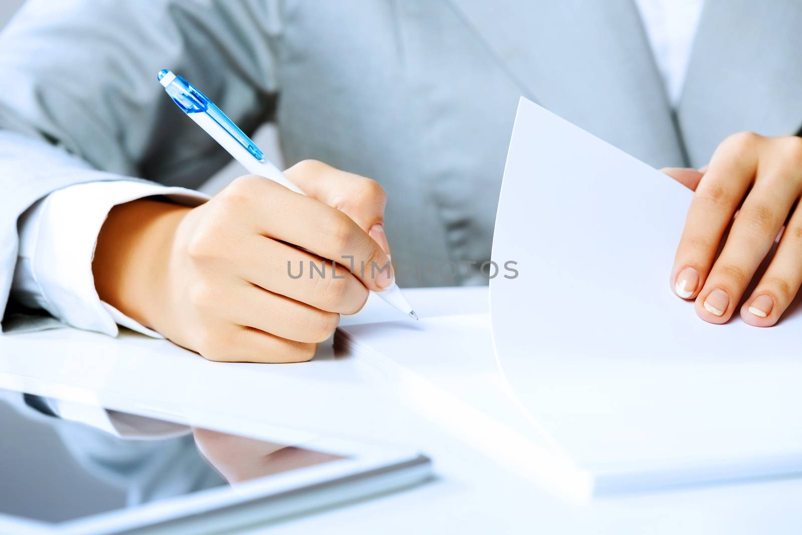 Close up image of businesswoman hands signing documents