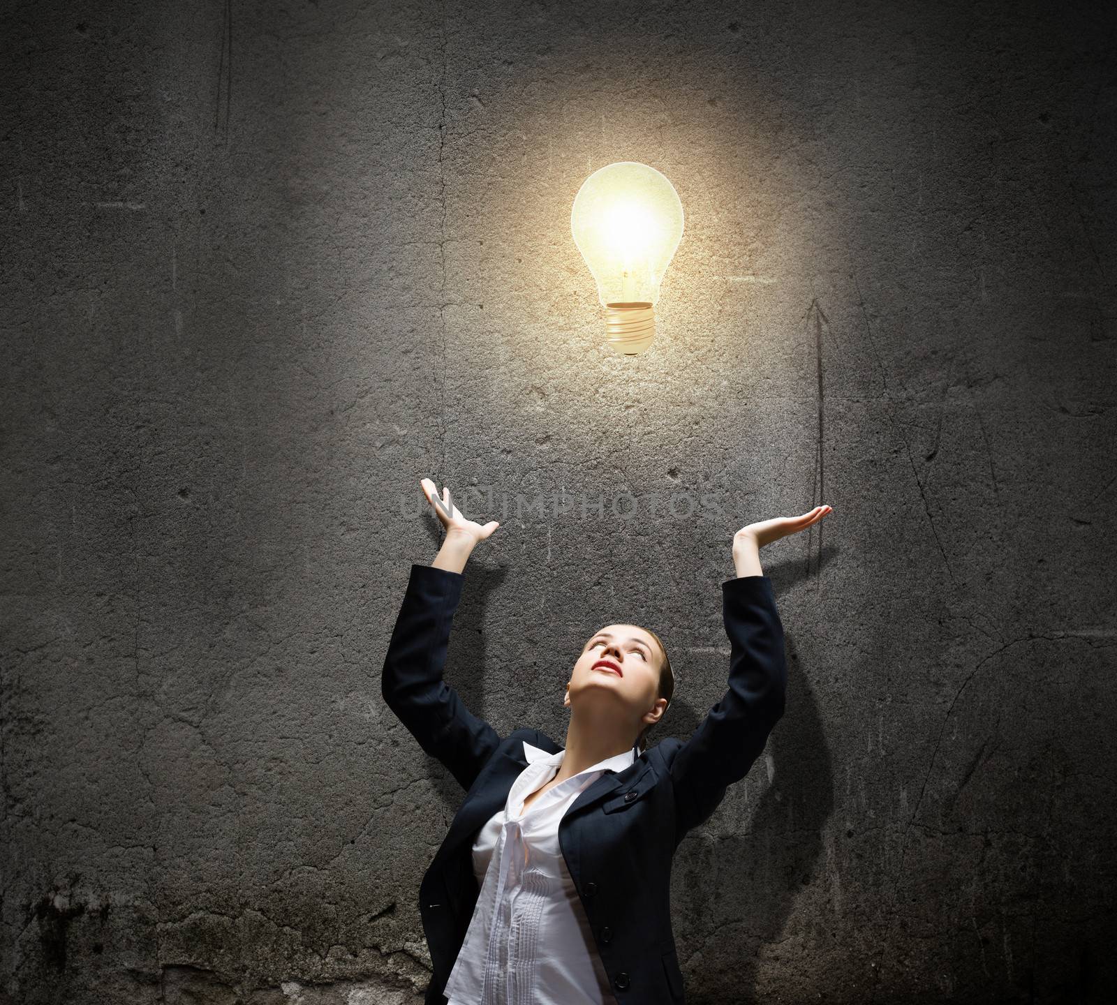 Image of businesswoman and electrical bulb. New idea