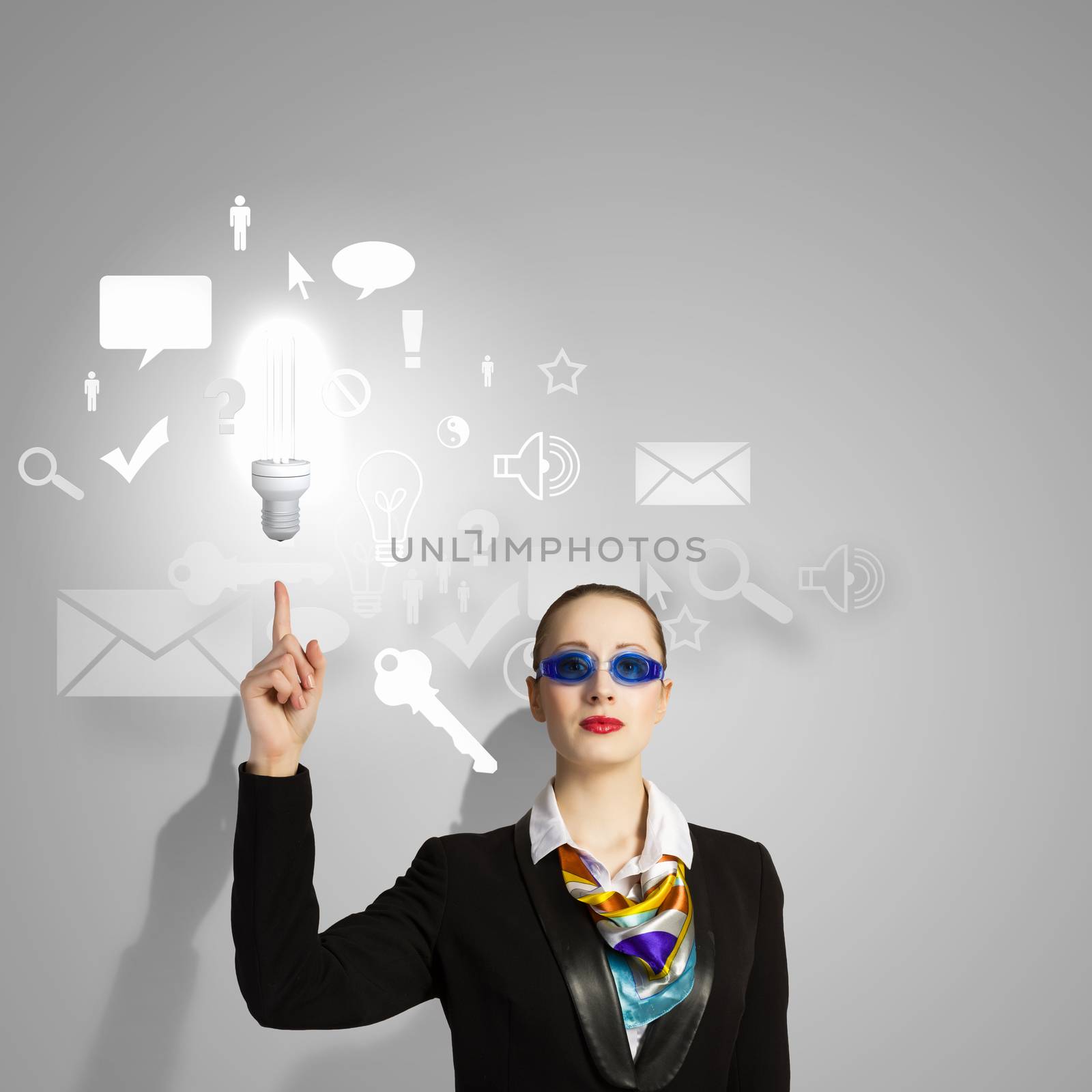 Image of businesswoman in goggles with business collage at background. Idea concept