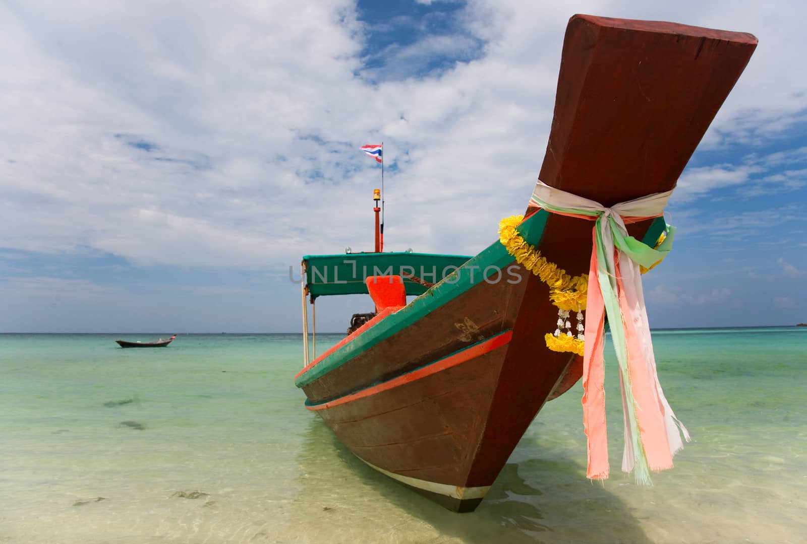A Long Tail Boat on Haad Salat Beach in Koh Pangan, Thailand 