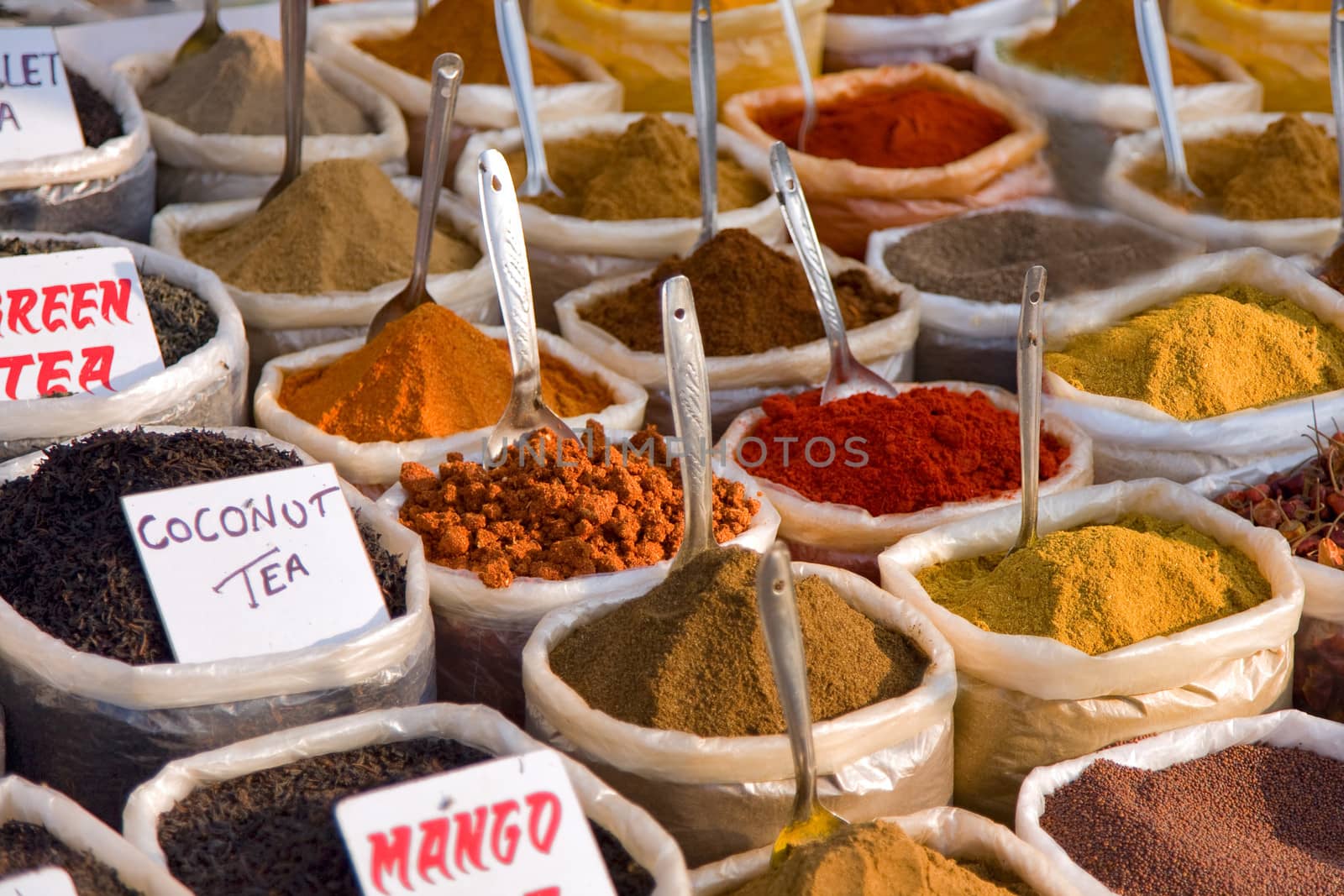 piles of Indian powder spices by foryouinf