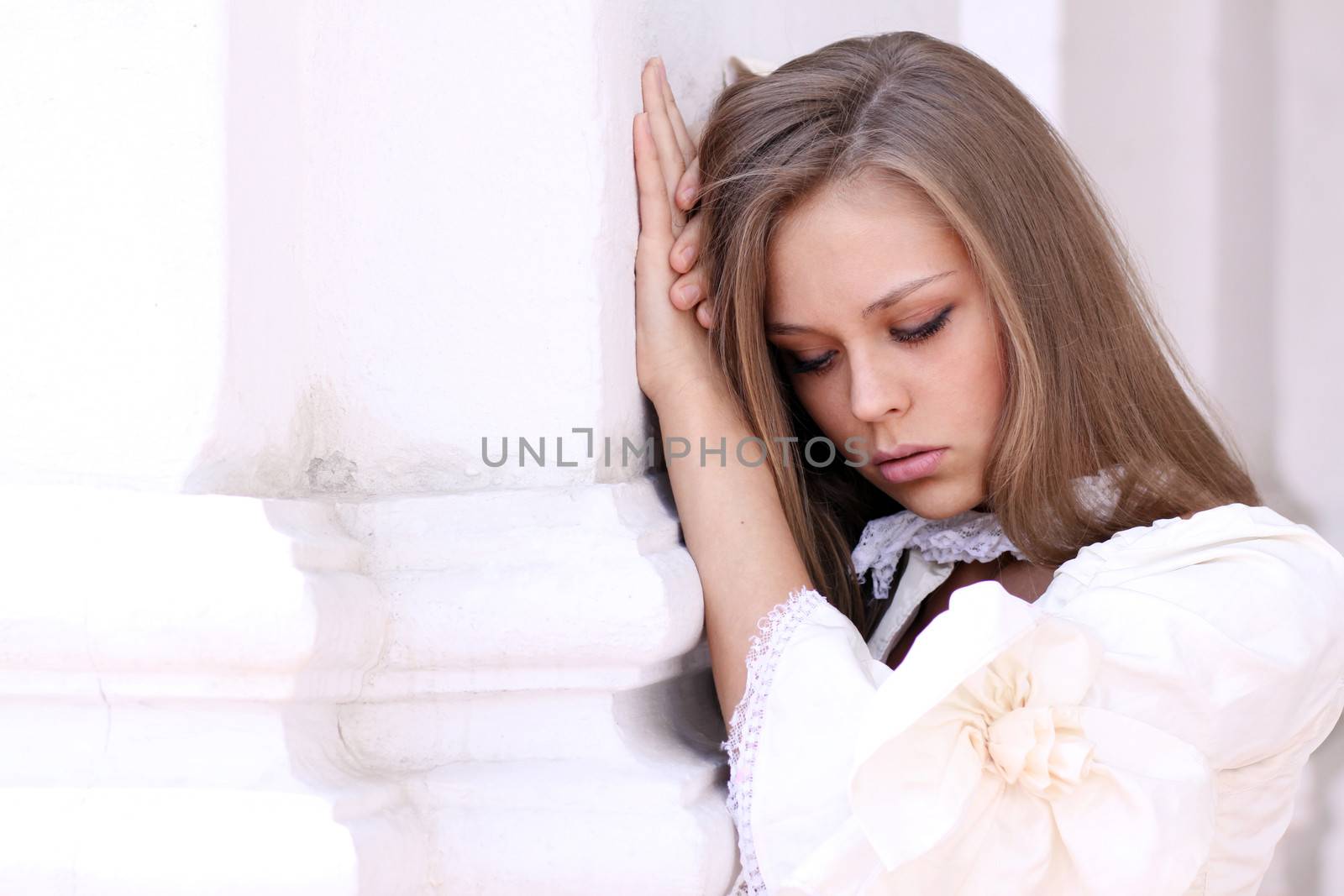 Beautiful young girl in pink dress