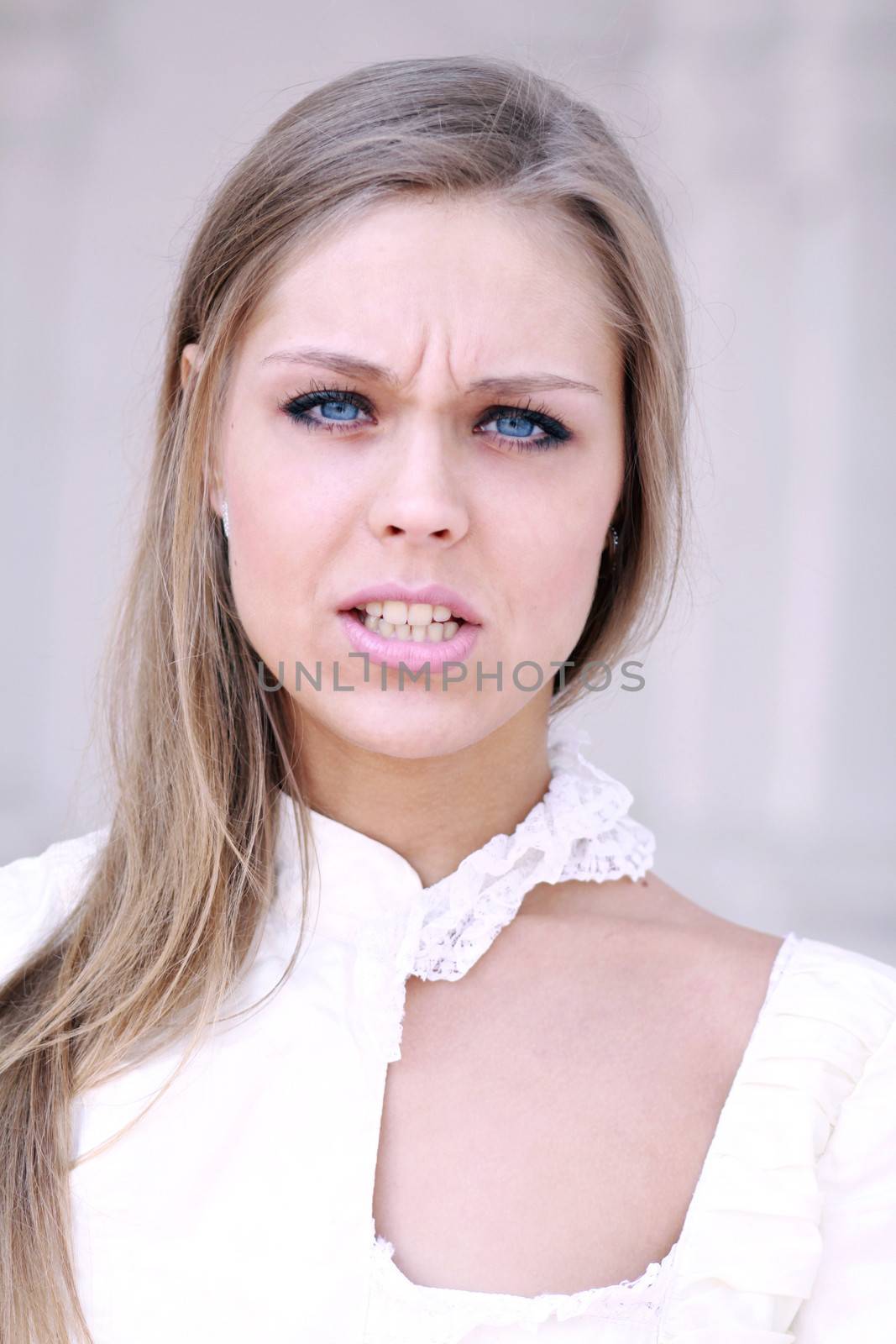 Portrait of young beautiful blond girl
