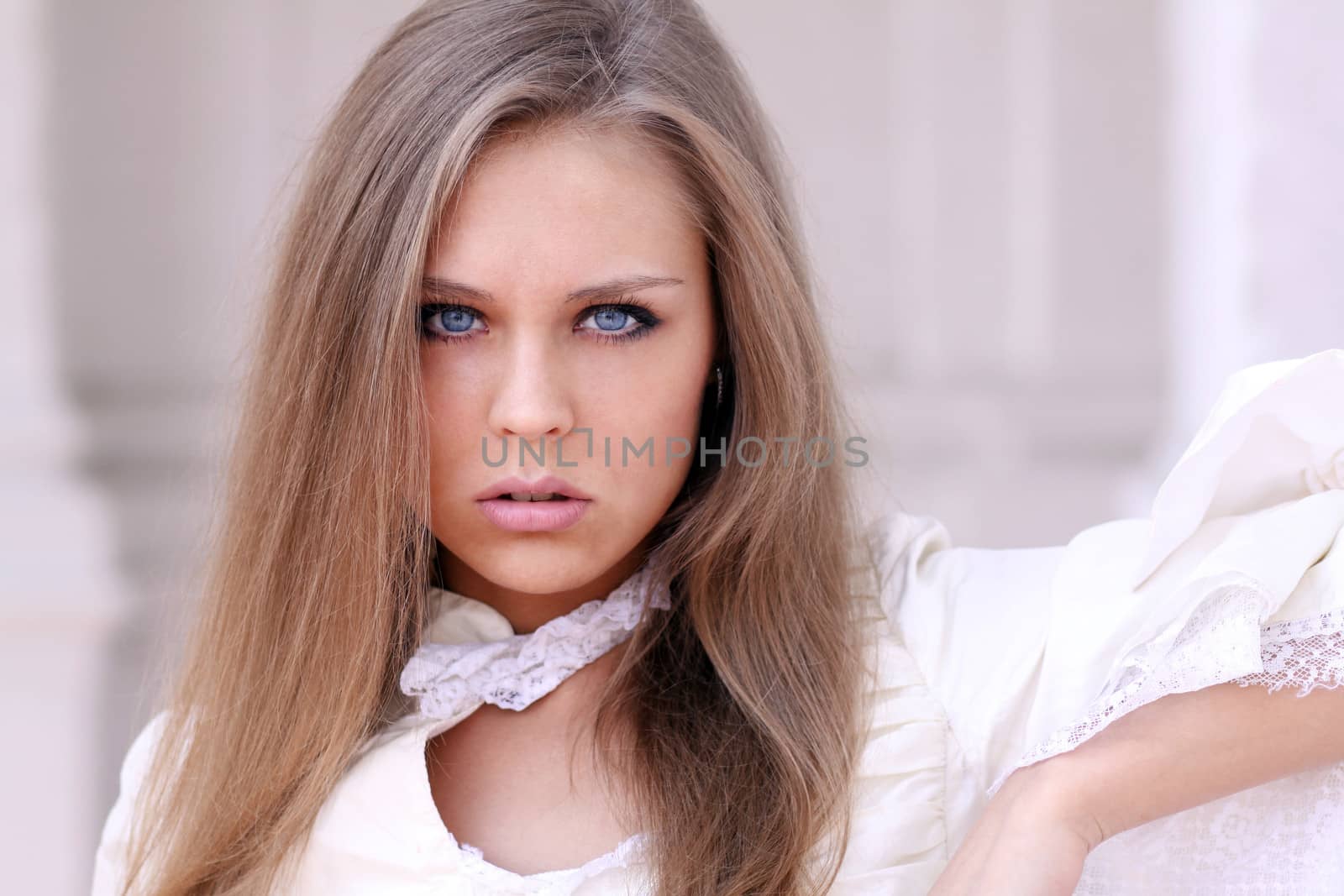Beautiful young girl in pink dress