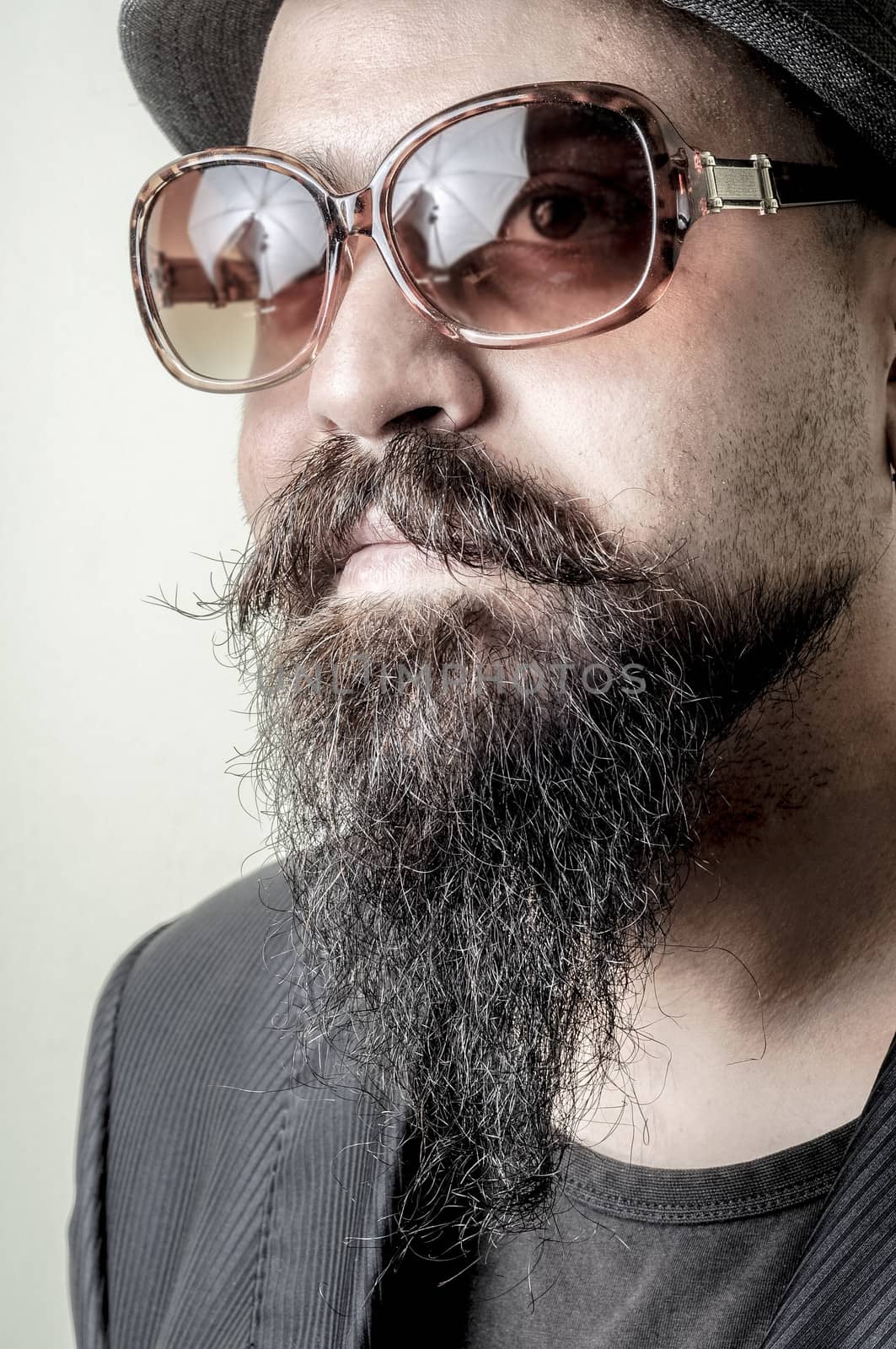 long beard and mustache hipster with elegant suit 