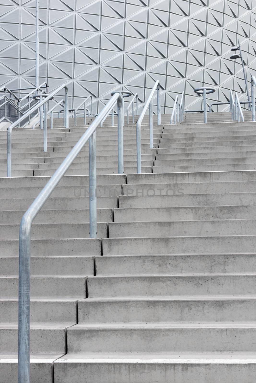 Stairway leading to a modern stadium. Contemporary architecture.