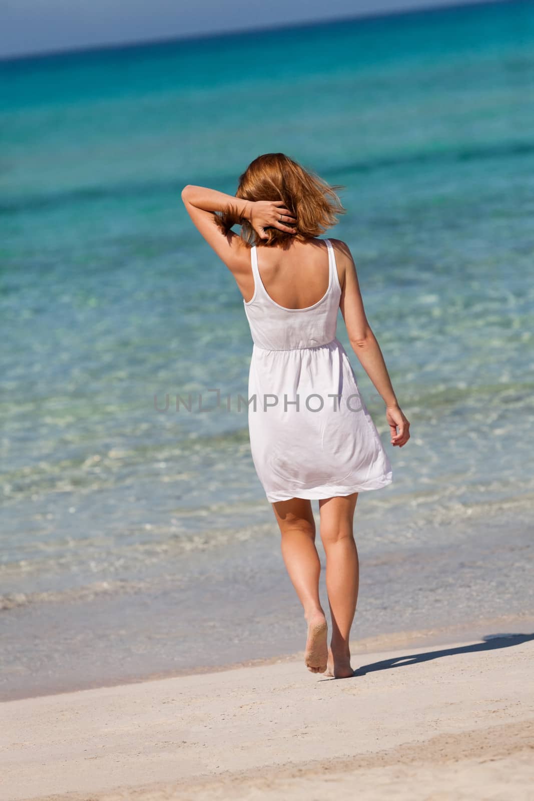 beautiful happy woman on the beach lifestyle summertime by juniart