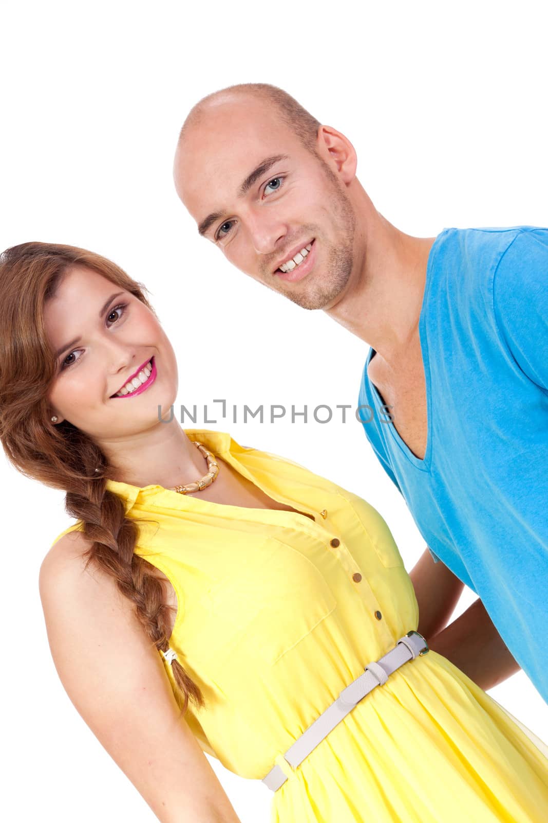 young smiling couple in love portrait isolated on white